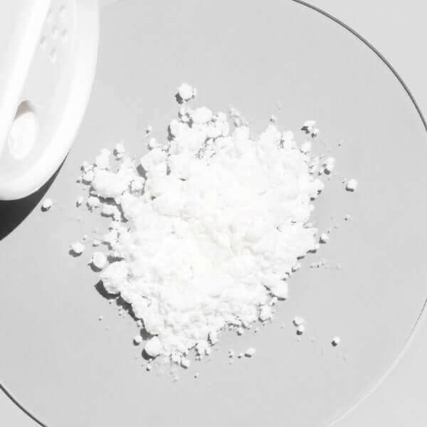 Close up of the crystals that are age-defying mixing powder and skincare booster that helps brighten and improve skin texture and tone.